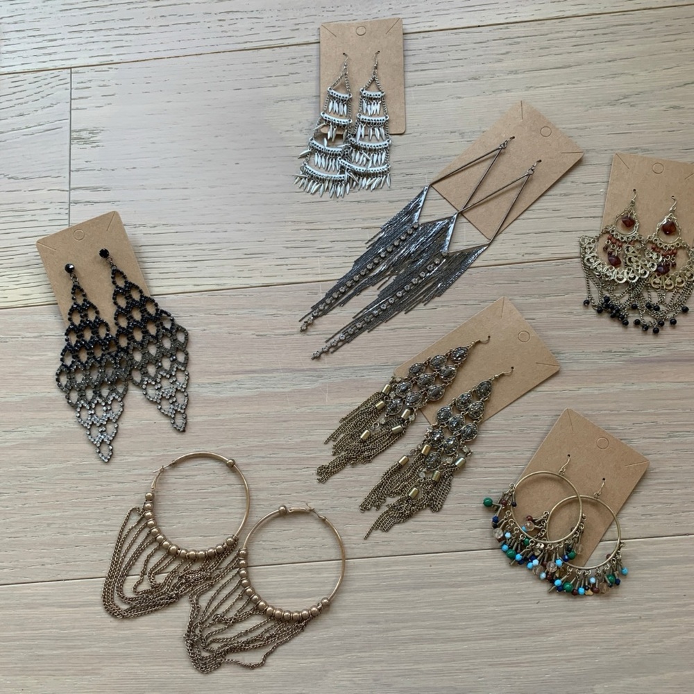 30 pairs of costume jewelry! Many oversized pairs, some feathers, studs etc